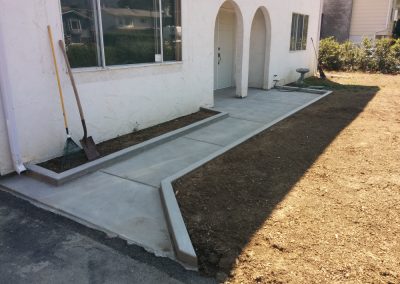 Concrete sidewalk to front door