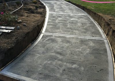 Curved concrete sidewalk