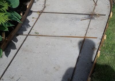 Rebar laid in preparation for pouring concrete sidewalk