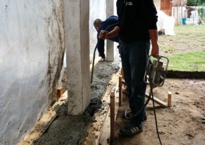 Pouring concrete for a concrete patio