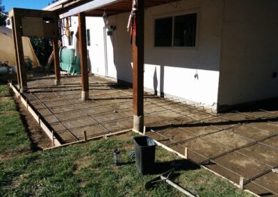 Rebar and forms laid for a new concrete patio