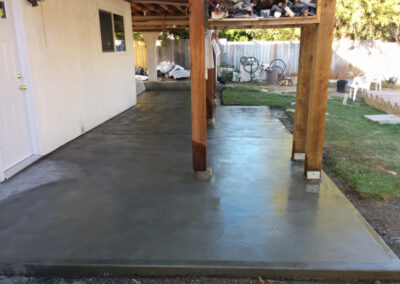 Concrete patio below a deck