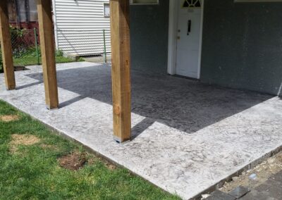 Concrete patio below a deck